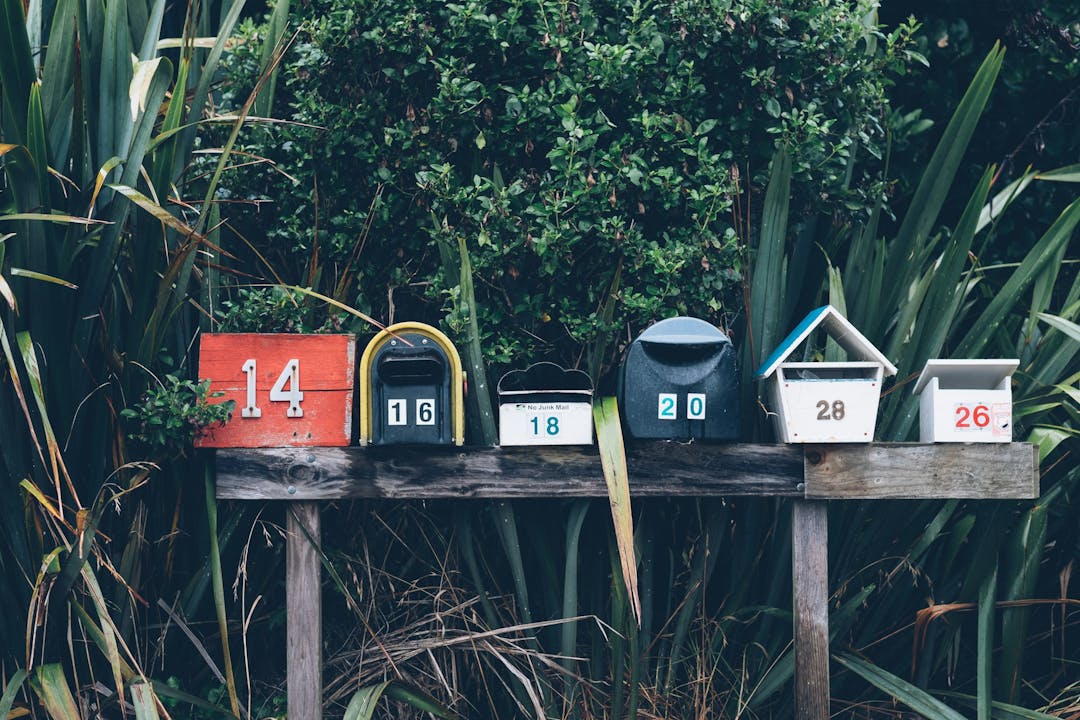 six assorted-color mailboxes photo